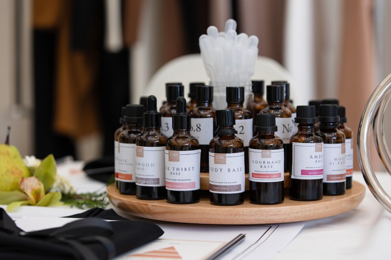 Cira fragrance bases on a wooden tray